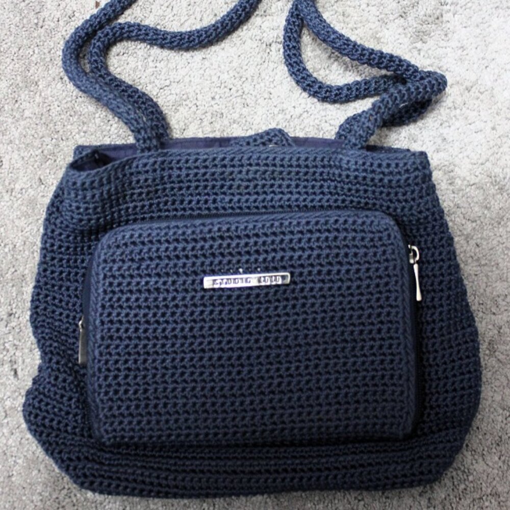 Studio 1010 blue crochet handbag.
